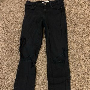 skinny, low waisted black jeans.